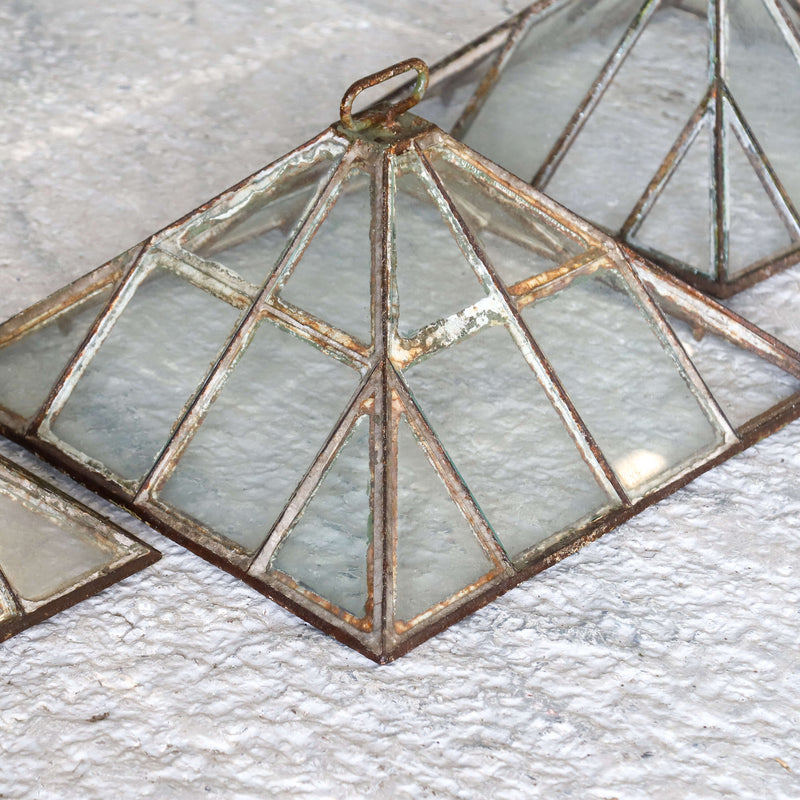 Set of three Victorian iron and glass pyramid garden cloches