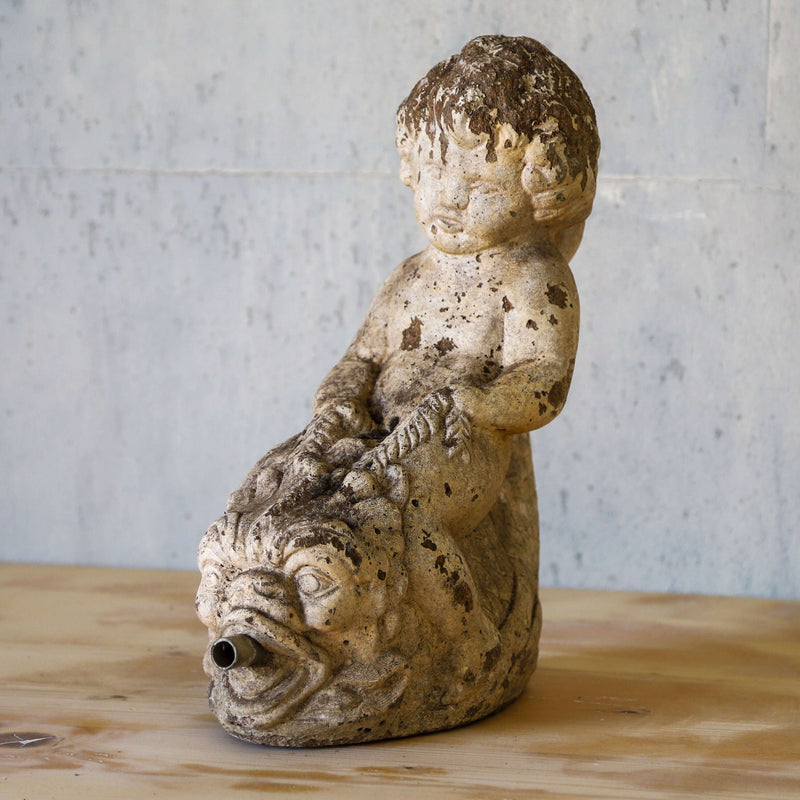 Mid 20th century classical style Cherub and Dolphins garden statue