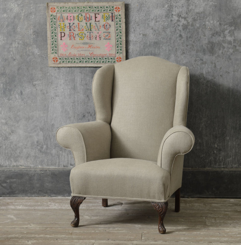Queen Anne style winged country armchair.