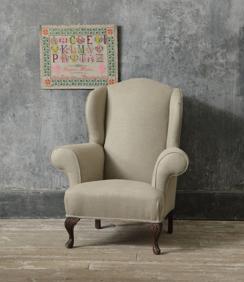 Queen Anne style winged country armchair.