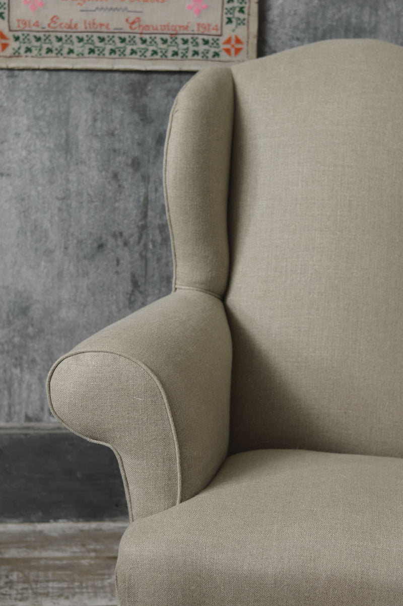 Queen Anne style winged country armchair.