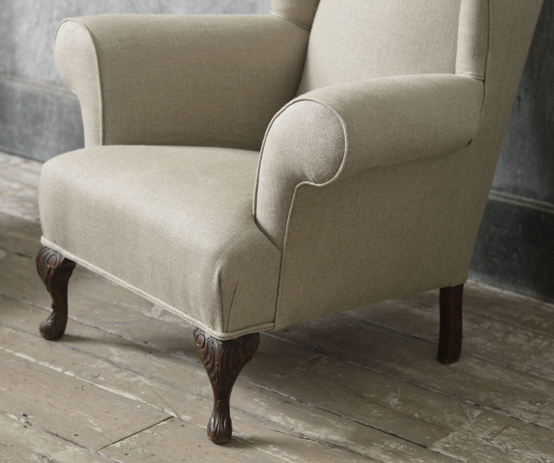 Queen Anne style winged country armchair.