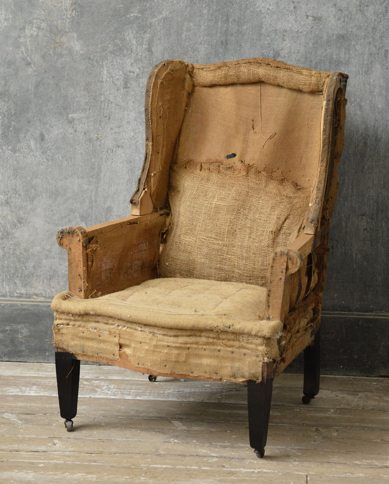 English 19th Century wing chair.