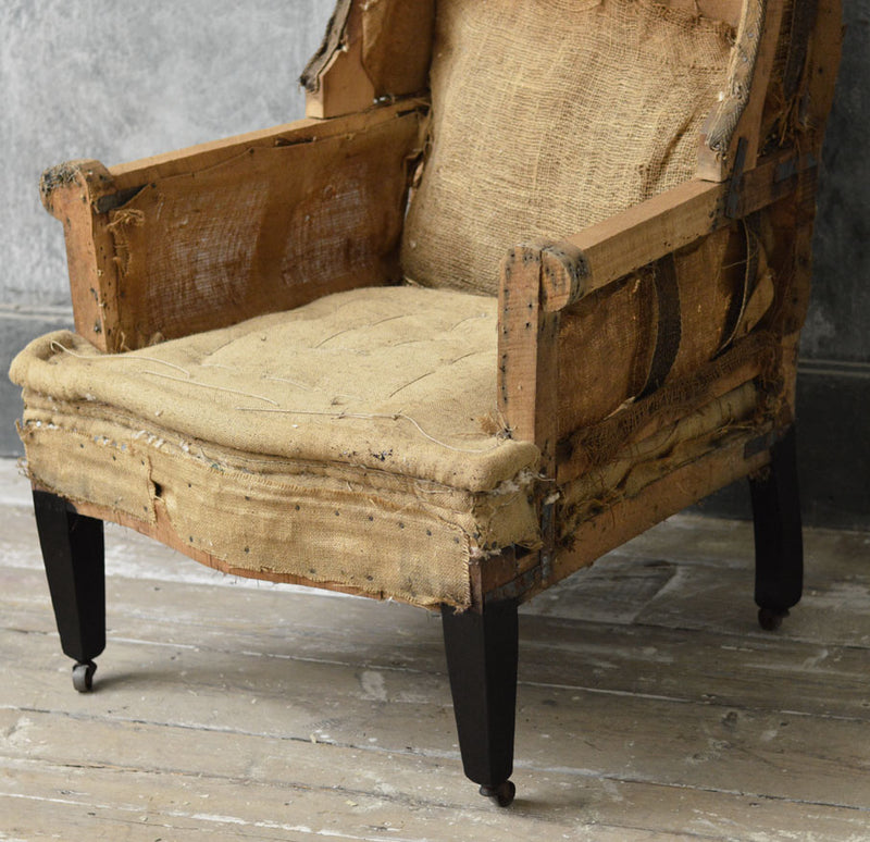 English 19th Century wing chair.
