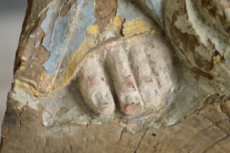 EARLY CARVING OF A SAINTS FOOT