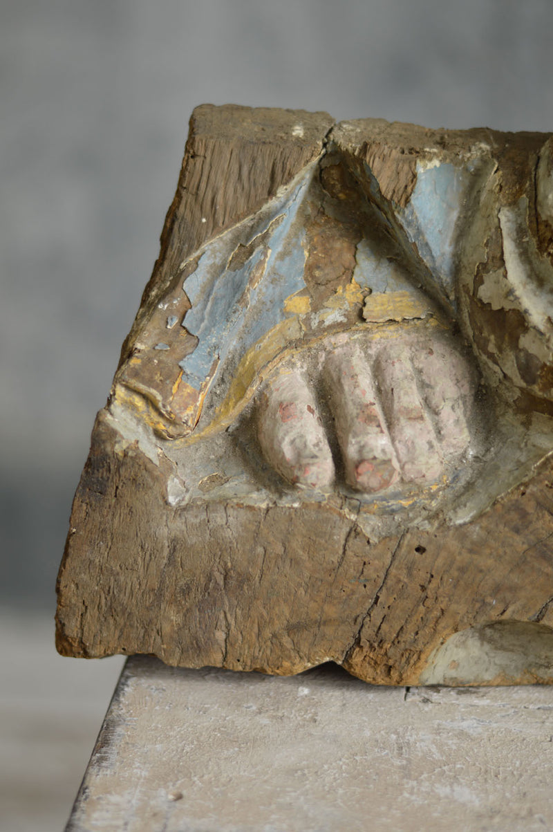 EARLY CARVING OF A SAINTS FOOT