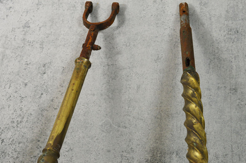 Pair of 19th Century carousel brass poles.