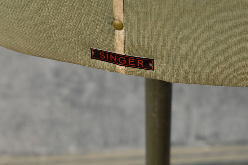 Singer mannequin on stand