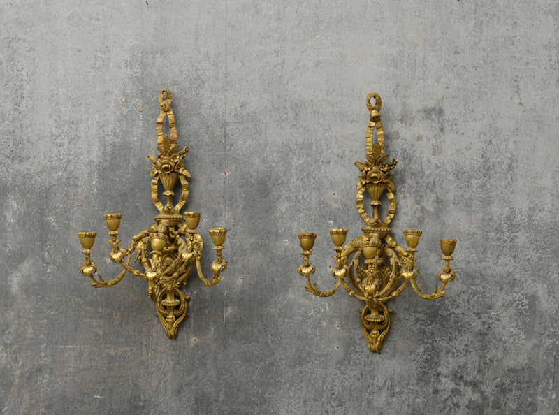 A pair of English  19th Century gilded sconces