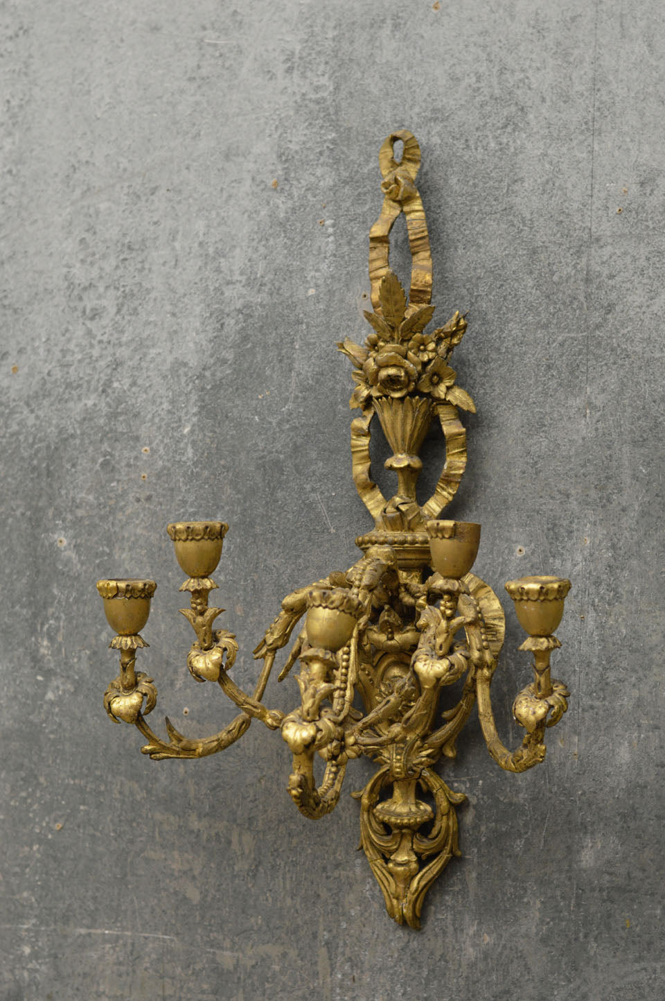 A pair of English  19th Century gilded sconces