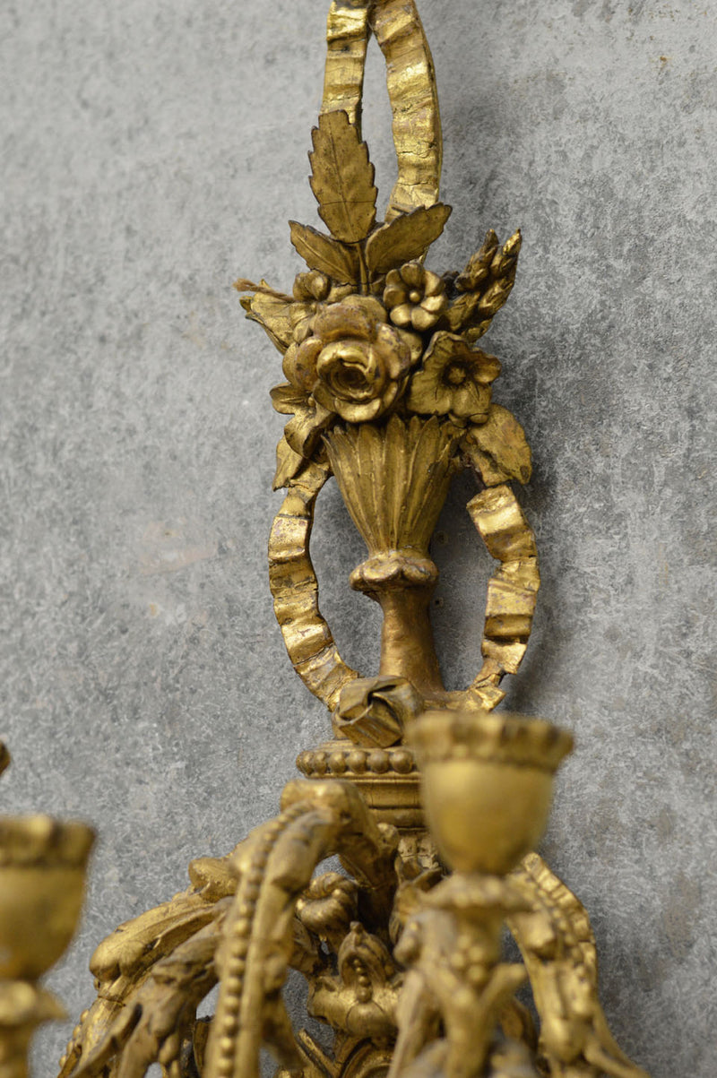 A pair of English  19th Century gilded sconces