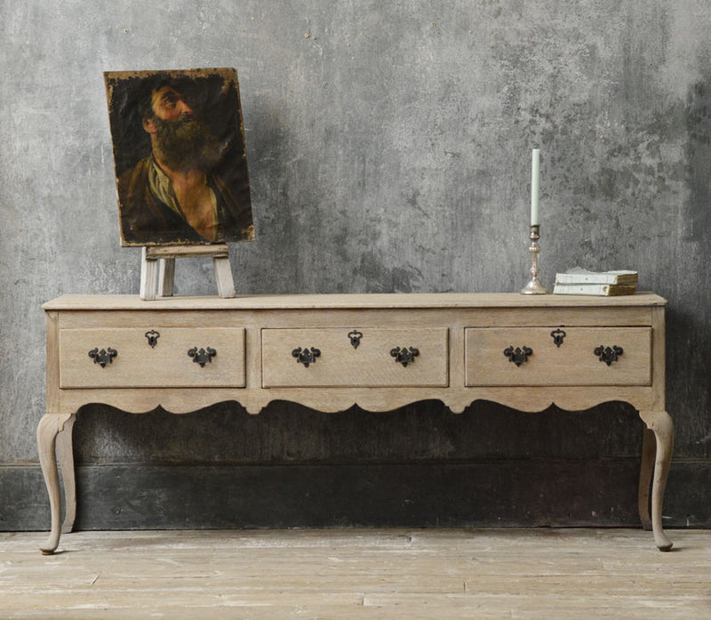English 18th Century bleached oak dresser base.