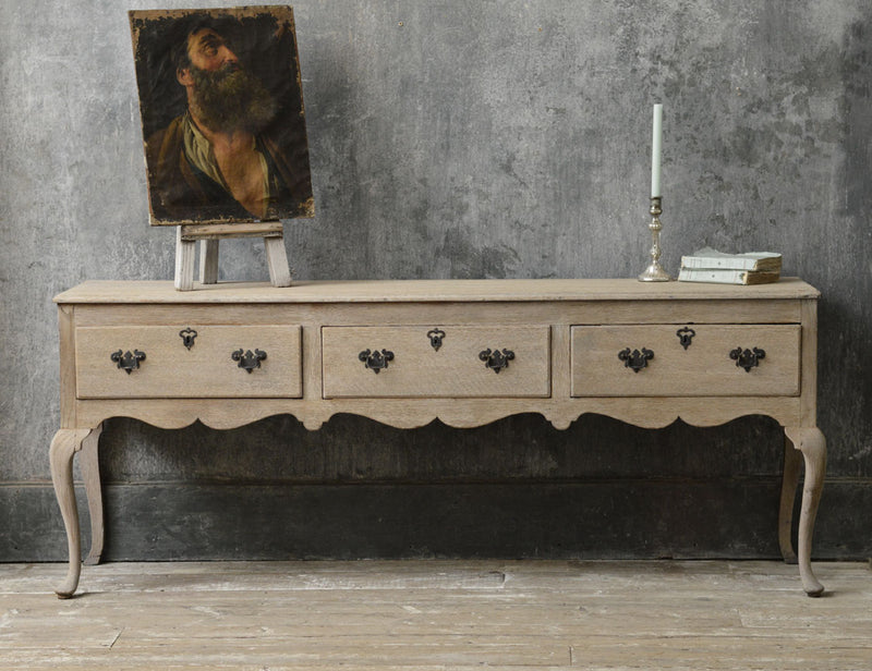 English 18th Century bleached oak dresser base.