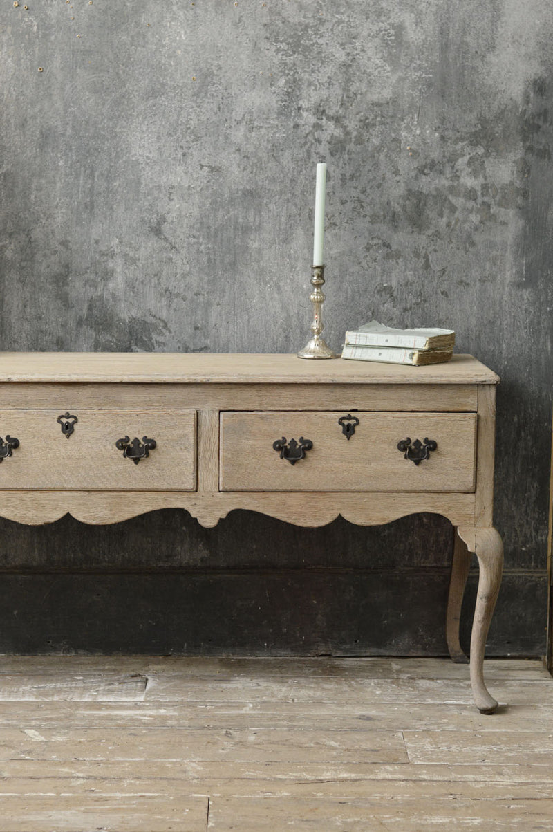 English 18th Century bleached oak dresser base.